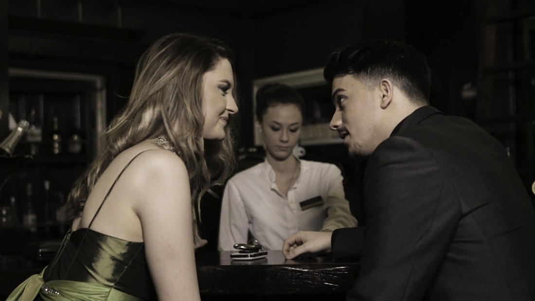 Georgina Markham as Envy, Alex Whitham and Tommy Lumley in the bar scene of short film Seven Deadly Sins
