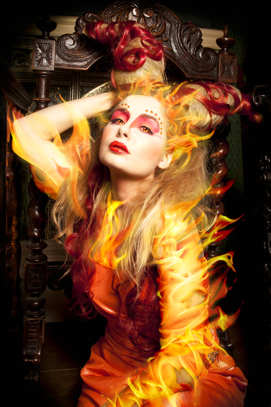Composite photography by artist Debra Jayne, Emily Hardisty as Wrath in Orange, Fire, Hair Covered Horns, Fantasy